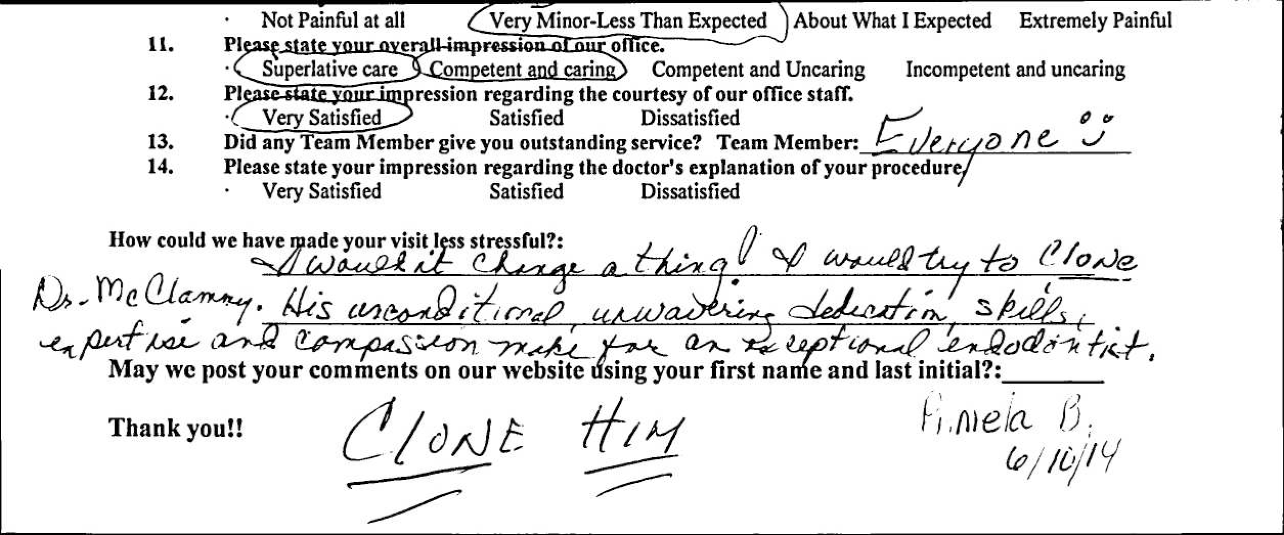 Handwritten patient feedback form with questions and written responses about dental experience.